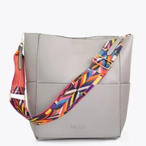 Merci bucket bag with two crossbody straps